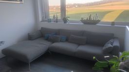 Graues Ecksofa