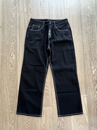 Sehr coole Jeans, Schwarz, Gr. XL, mit Stickerei, Neuwertig