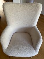 Weisser Polstersessel