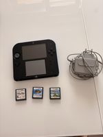 Nintendo 2ds + chargeur + 3 jeux