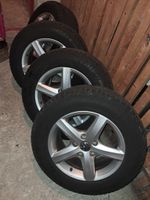 4 jantes VW  avec p us hiver 235/65 R17 108 H, parfait état!