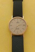 Omega De Ville Herrenuhr goldfarben mit Datum
