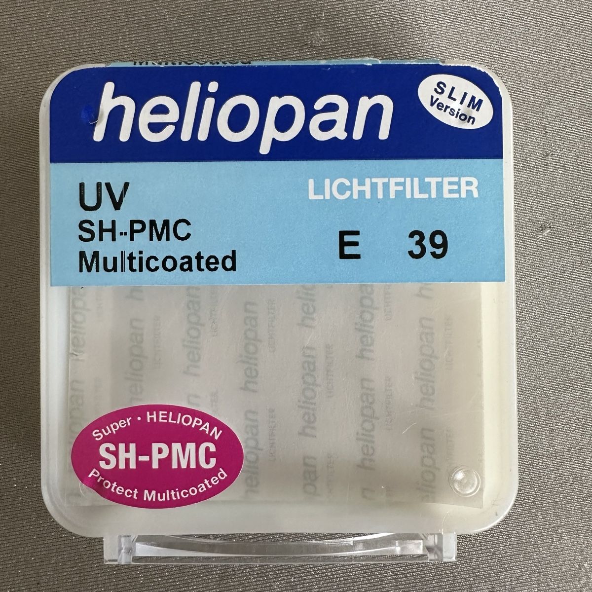 Filtri: UV Filter Heliopan E39, slimline, Messing – Usato da St-Gingolph venduto da Edgar1920