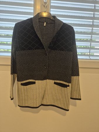 Gilet à motifs noir et blanc taille XL jamais utilisé 