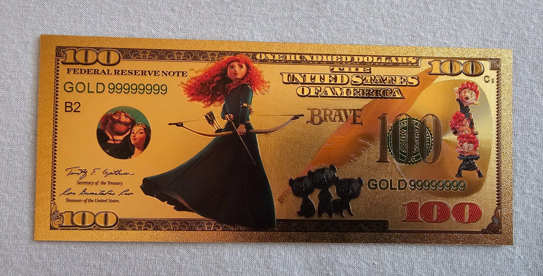Banconote: 100 Dollar Gold Note Disney "Merida" SAMMLERSTÜCK – Nuovo e nell'imballaggio originale da Bütschwil venduto da Taborana