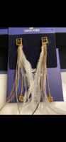 Orecchini pendenti Swarovski con piume
