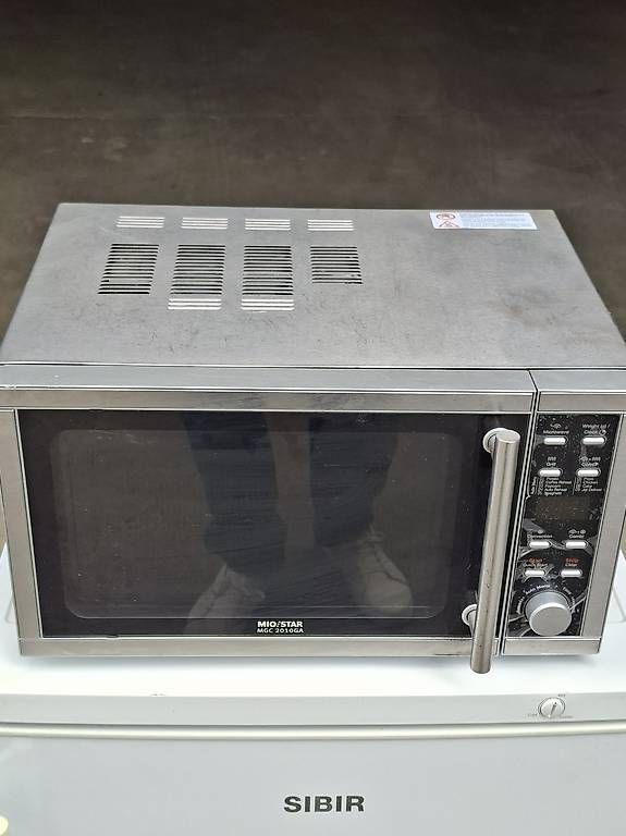 Elettrodomestici da cucina: Mikrowelle mit schutzfolie auf dem Display – Usato da Diessenhofen venduto da mkjw 3