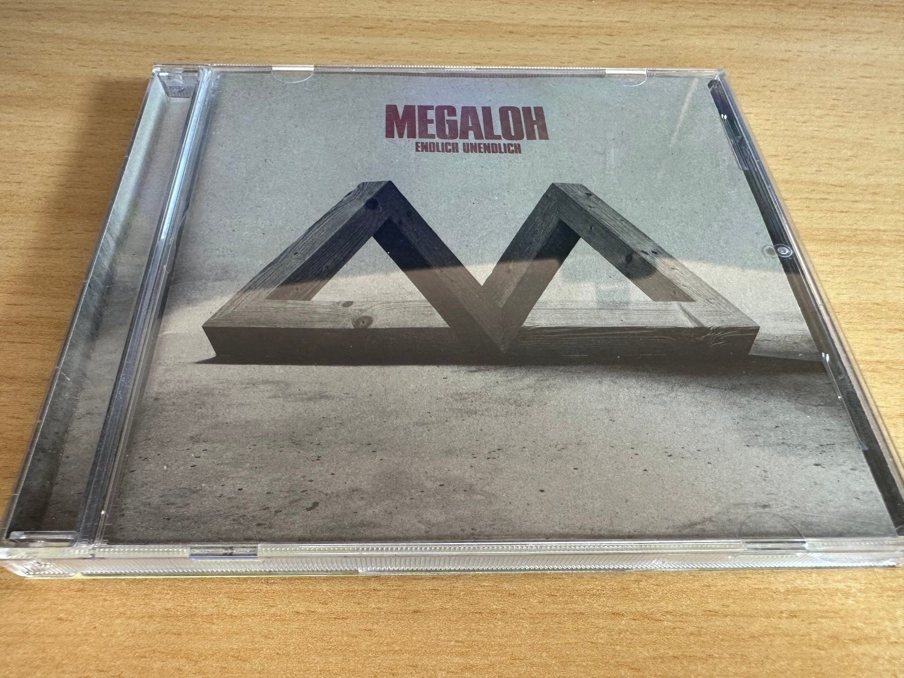 CD: Megaloh – Endlich Unendlich – Usato da Rikon im Tösstal venduto da Alpenmutz