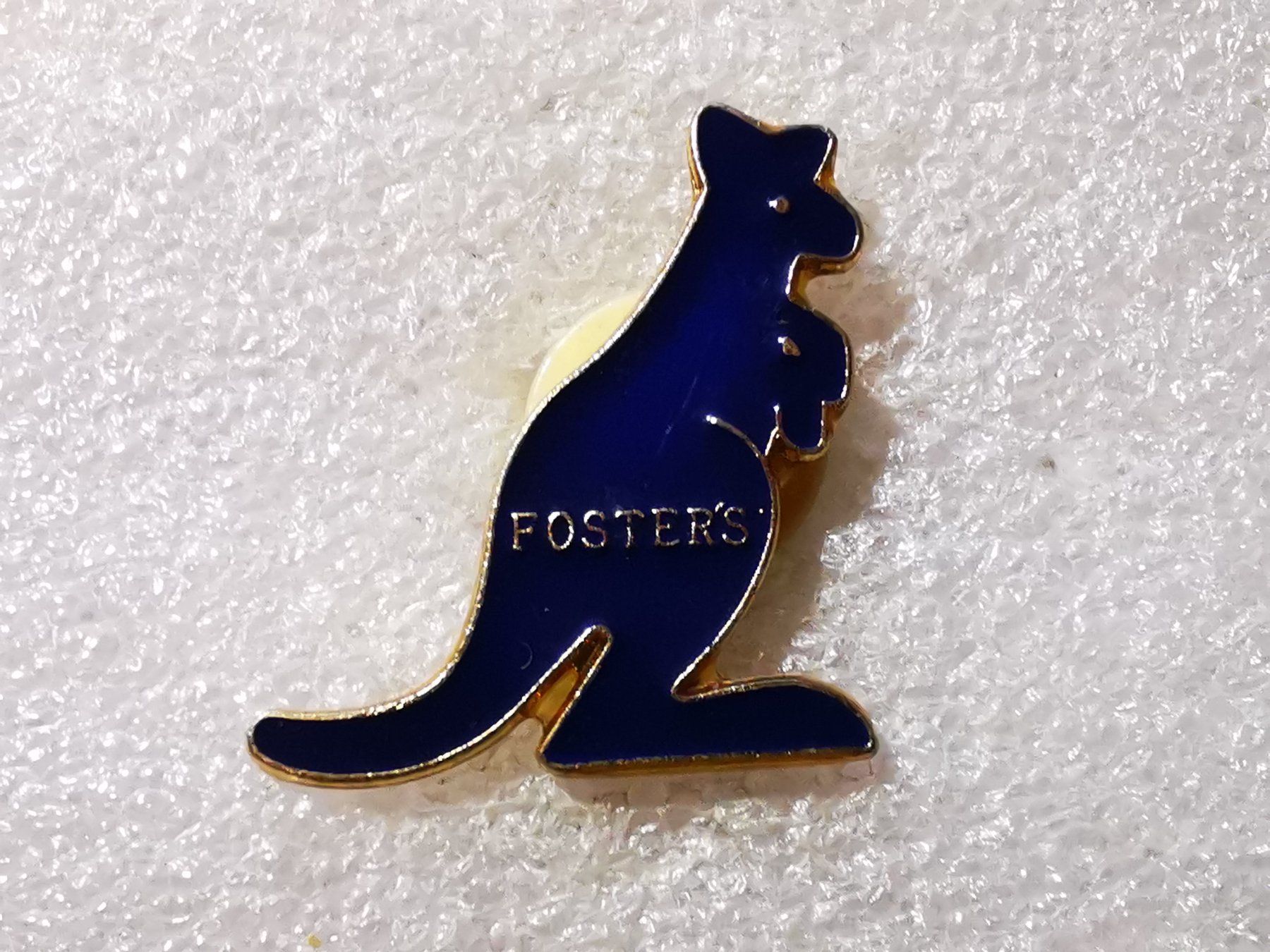 Placchette & Badge: Ansteckpin 52: Foster's – Usato da Oppligen venduto da Pin-Fall-Shop