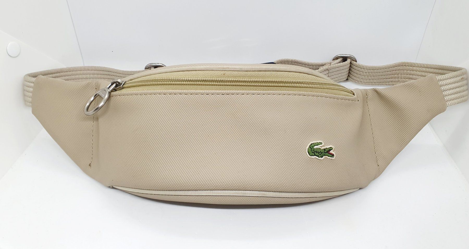 Lacoste Borse: LACOSTE BAUCHTASCHE BEIGE NEUWERTIG – Nuovo (secondo la descrizione) da St. Gallen venduto da CaliSunshine