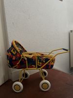 Puppenwagen gelb bunt mit Stoffbezug guter Zustand
