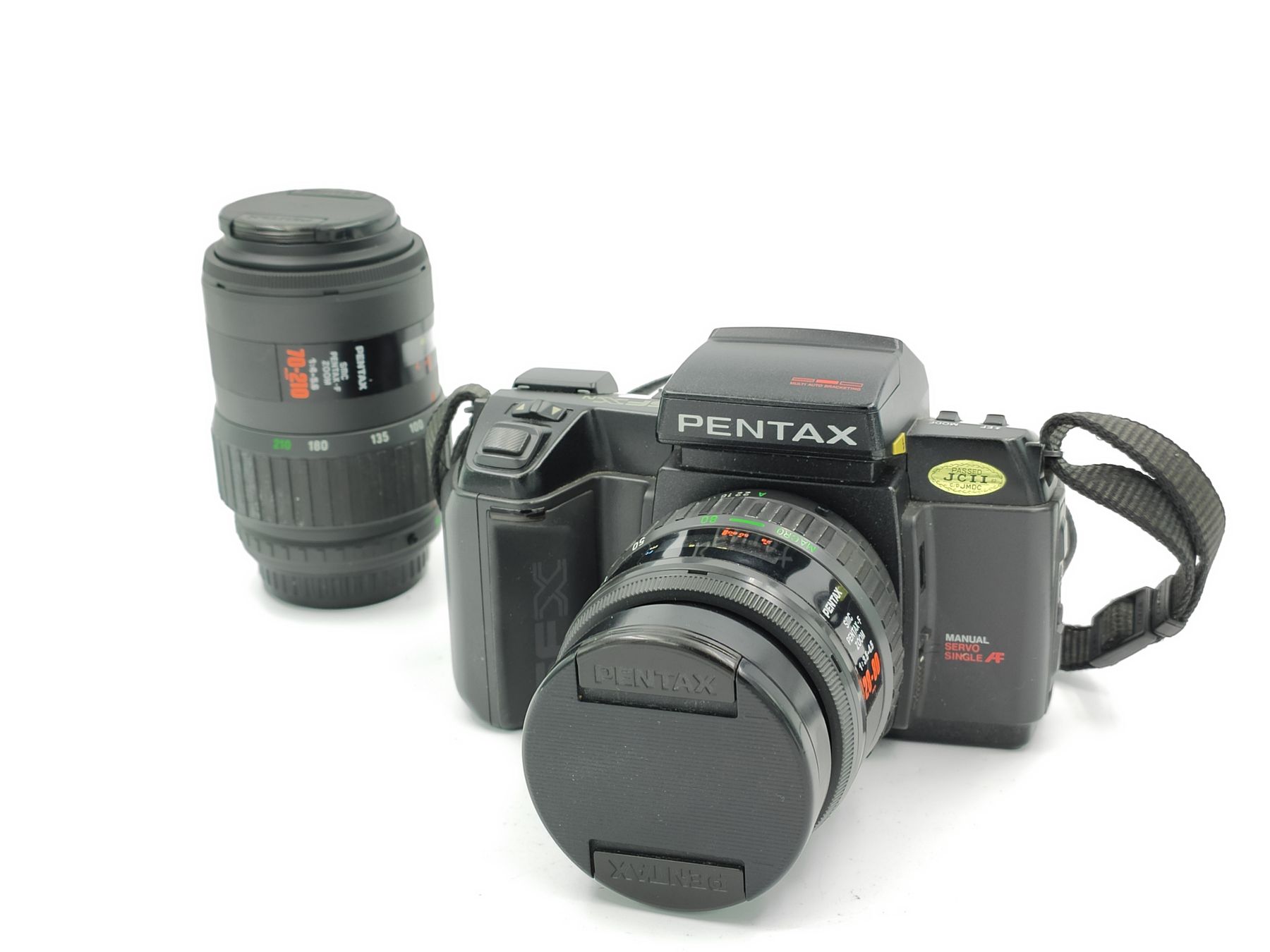 Pentax Fotocamera: Pentax SFx Analog Kamera mit Objektiven – Usato da Kreuzlingen venduto da Tewes