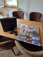 Playstation 3 mit 10 Spielen