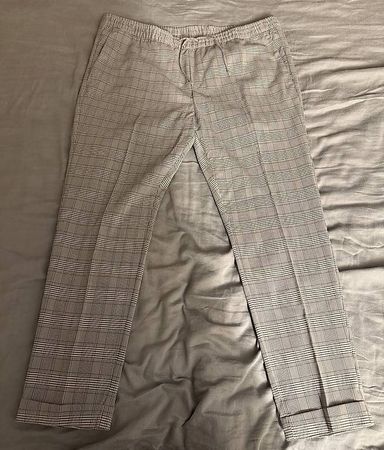 Beige karierte Hose 