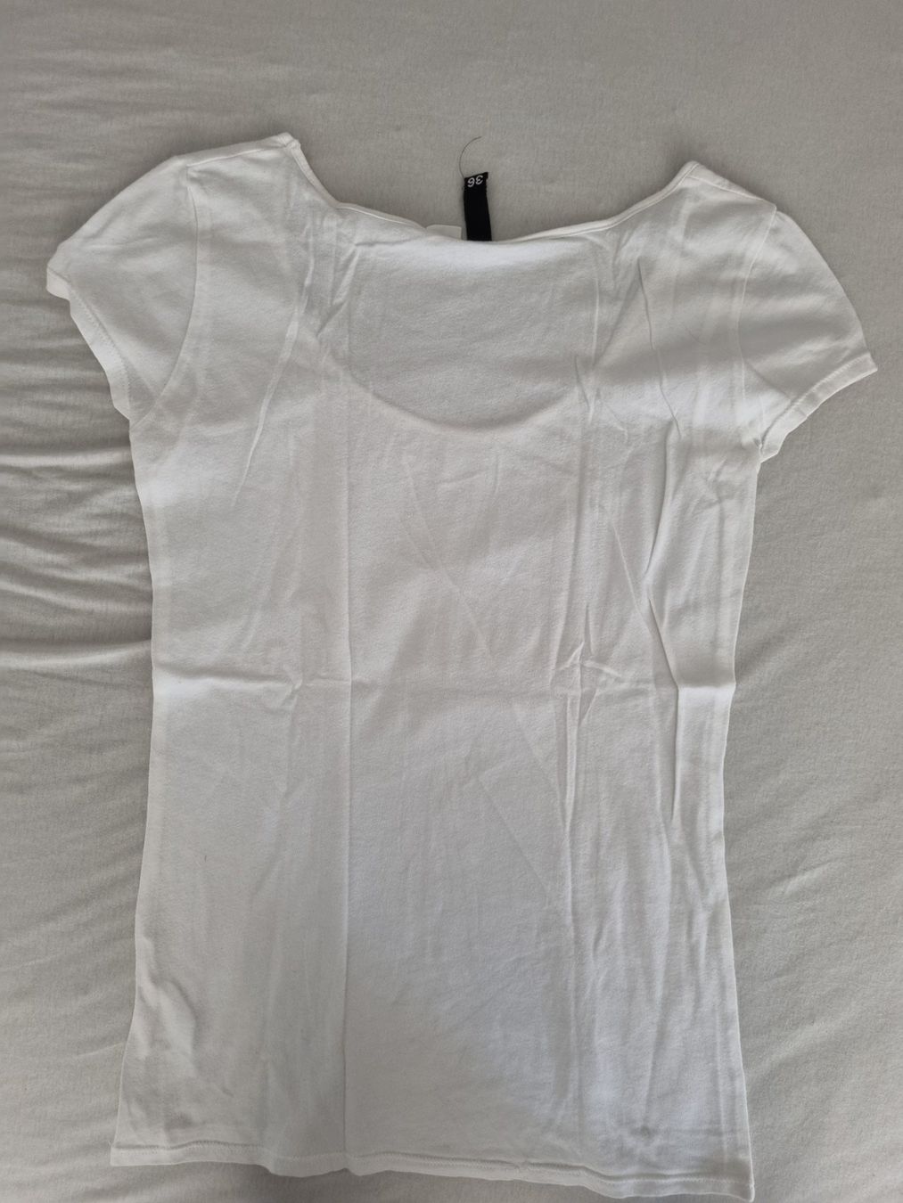 H&M T-Shirts: Weisses T-Shirt "Devided by H&M" (Gr. 36) – Gebraucht aus Gams von federli29 1
