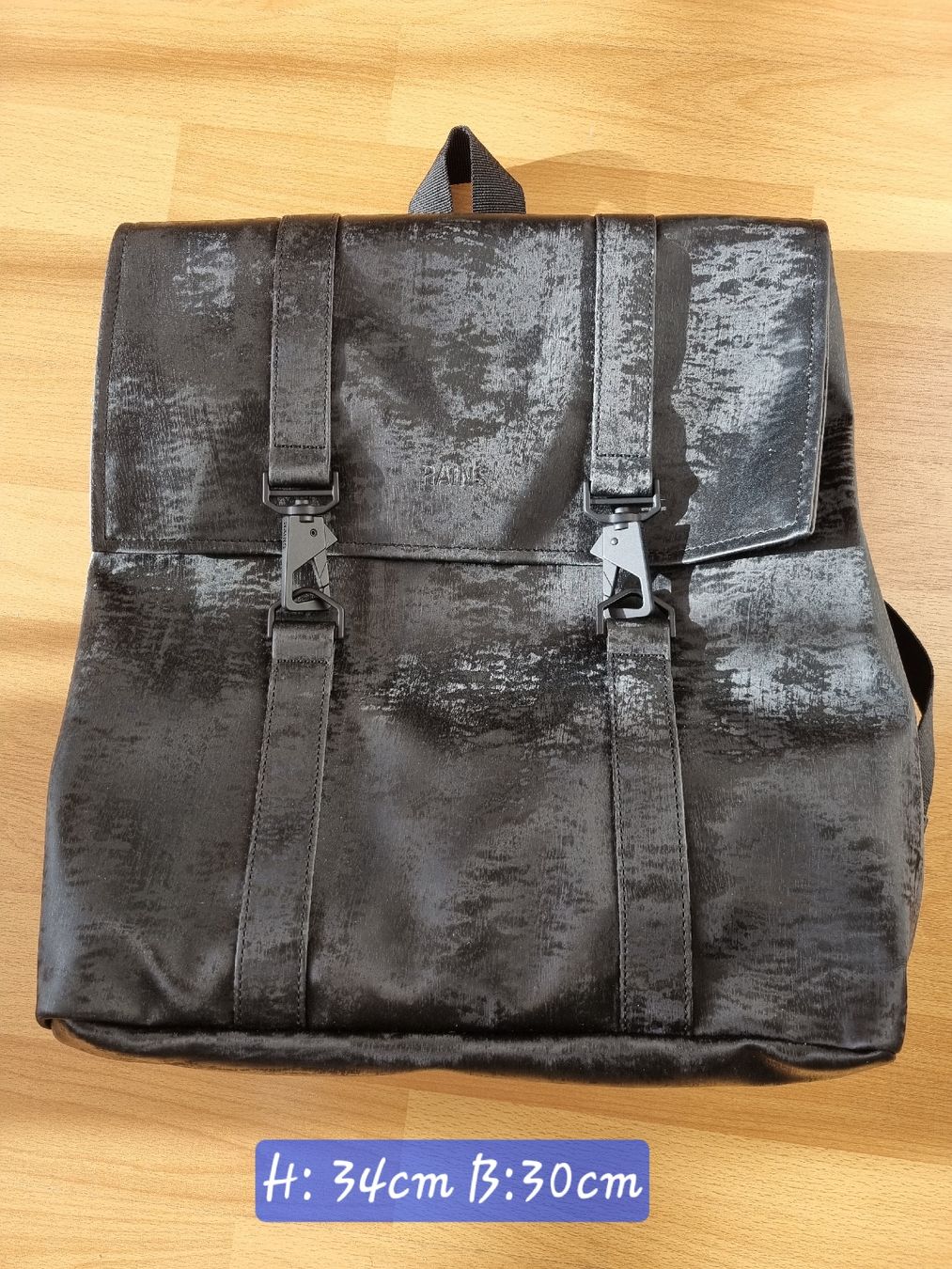 Zaini: Schwarzer Rains Rucksack, neuwertig – Usato da Laupen BE venduto da Bombers