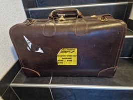 Valise vintage en cuir marron