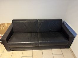 Schlafsofa Leder schwarz ausklappbar