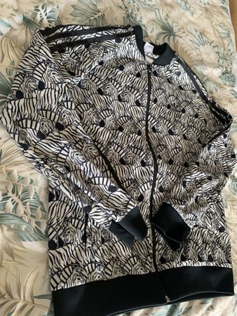 Giacca Adidas a stampa zebra taglia M usata, perfetta per l'