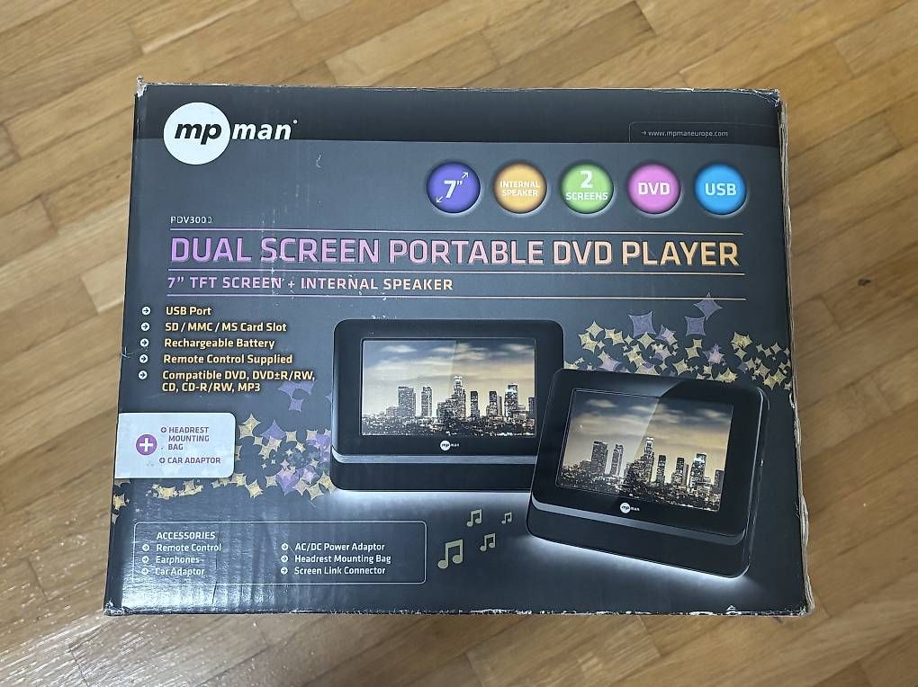 Sistemi audio & multimediali: MpMan Dual Screen Portable DVD Player – Usato da Zürich venduto da Nurich
