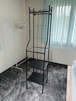 Black metal shelf unit