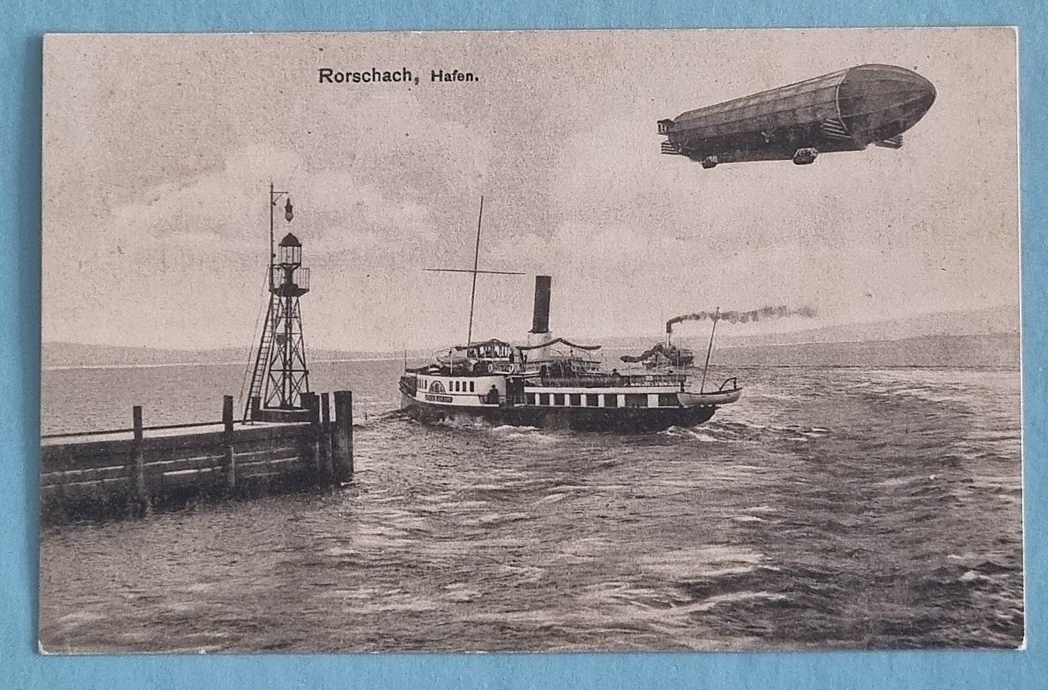 Cartoline postali: Rorschach - Dampfer bei Hafeneinfahrt - Luftschiff - 1909 – Usato da Rothrist venduto da RROENK