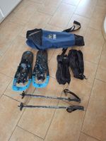 Schneeschuhe mit Stöcken,  Stulpen und Tasche
