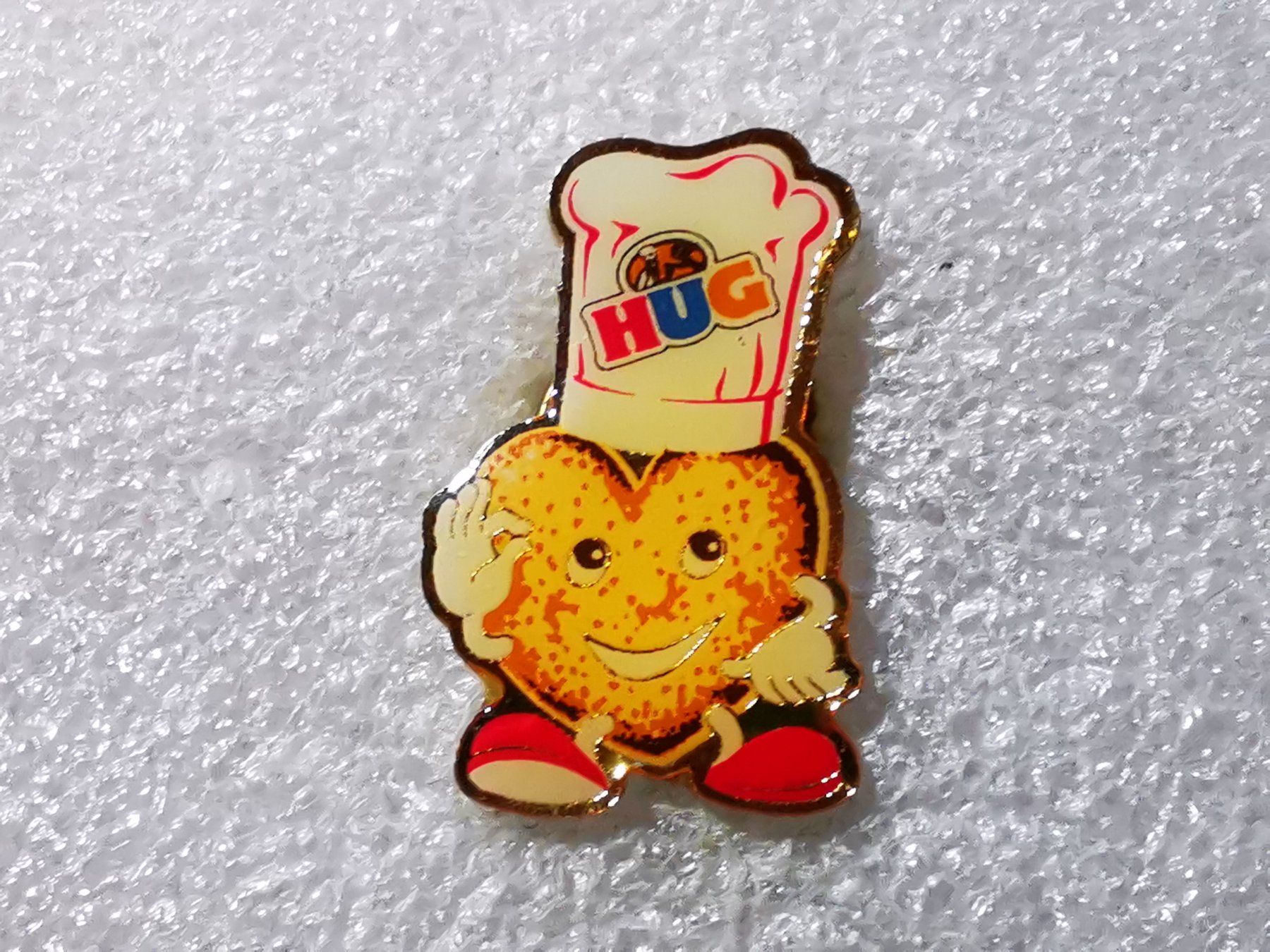 Placchette & Badge: Ansteckpin 59: Hug – Usato da Oppligen venduto da Pin-Fall-Shop