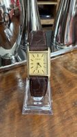 Montre Tissot rectangulaire plaqué or vintage femme