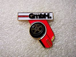 Ansteckpin 82: GmbH