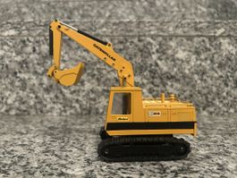 Caterpillar 215, 1:50 , NZG