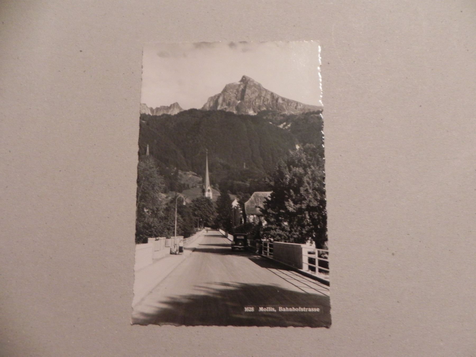 Cartoline postali: Ansichtskarte Mollis GL Bahnhofstrasse – Usato da Siebnen venduto da krimsie