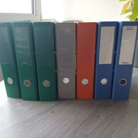 7 classeurs multicolores état d'occasion