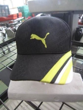 PUMA Cap gelb/schwarz