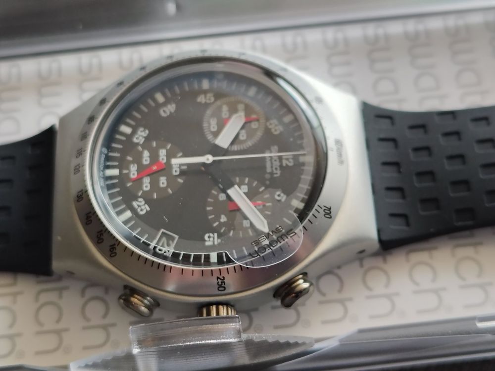 Swatch Montres: UBS Swatch Irony  150 Years Jubiläumsuhr Neu + UBS Kopfhörer – Neuf avec emballage d'origine à Dietikon par Shotokan2020 2