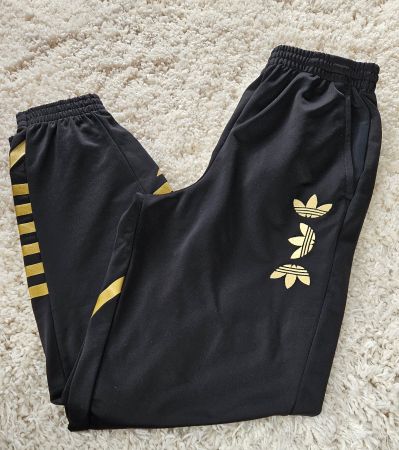 Adidas Jogginghose, schwarz/gold, Gr. S