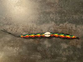 Armband mit Muschel / Bracelet avec coquillage