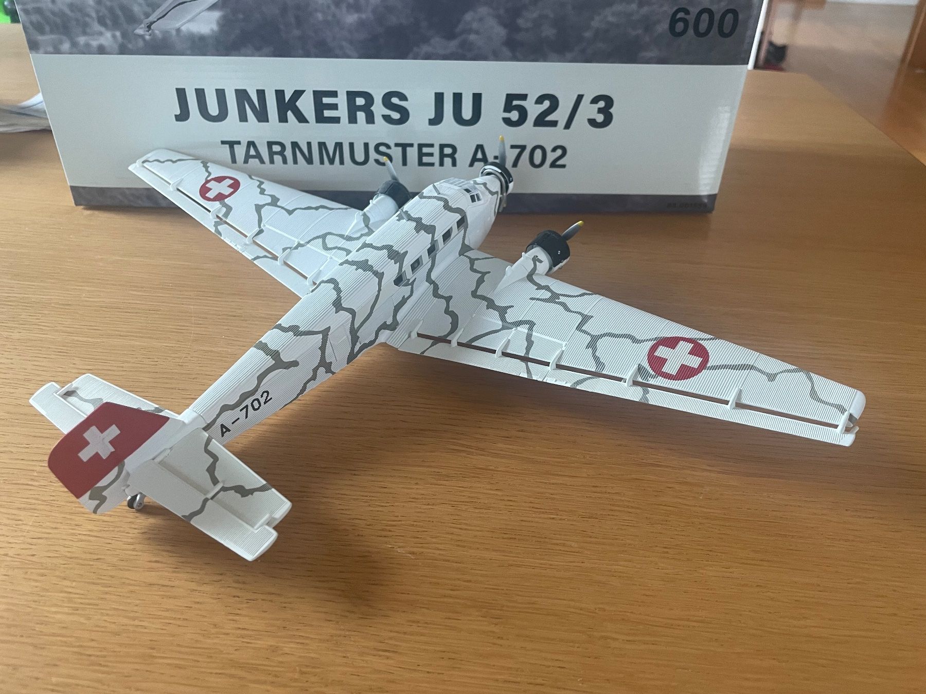 Swissair Kit di modellismo & Modellini statici: Ju-52 Schweizer Luftwaffe A-702  mit Tarnbemalung, 1/72 – Nuovo e nell'imballaggio originale da Hochfelden venduto da aviatikboerse_top 1