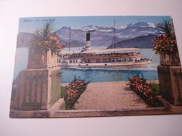 PK Weggis, Am Quai mit Dampfschiff Schiller, um 1910 farbig