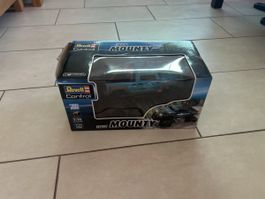 RC Auto Revell Control Truck Mounty Massstab 1:16 neu