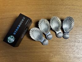 4 cuillères coquille en métal argenté