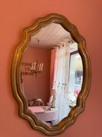 Miroir mural doré à la feuille d’or