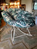 Rocking garden chair with pillow
