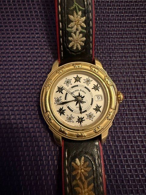 Michel Jordi Orologi: „Seltene Michel Jordi Ethno Herrenuhr – All Edelweiss Ziffer – Usato da Kloten venduto da Niemalsbescheiss