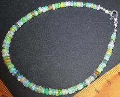 Armband L-4347 – Äthiopische Multi Feuer Opal Rondellen 23cm