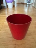 Vaso rosso per piante usato