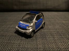 Spielzeugauto/MatchboxCar - Siku - Smart Fortwo Polizei