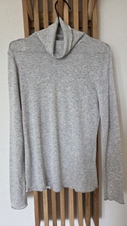 Pull col roulé