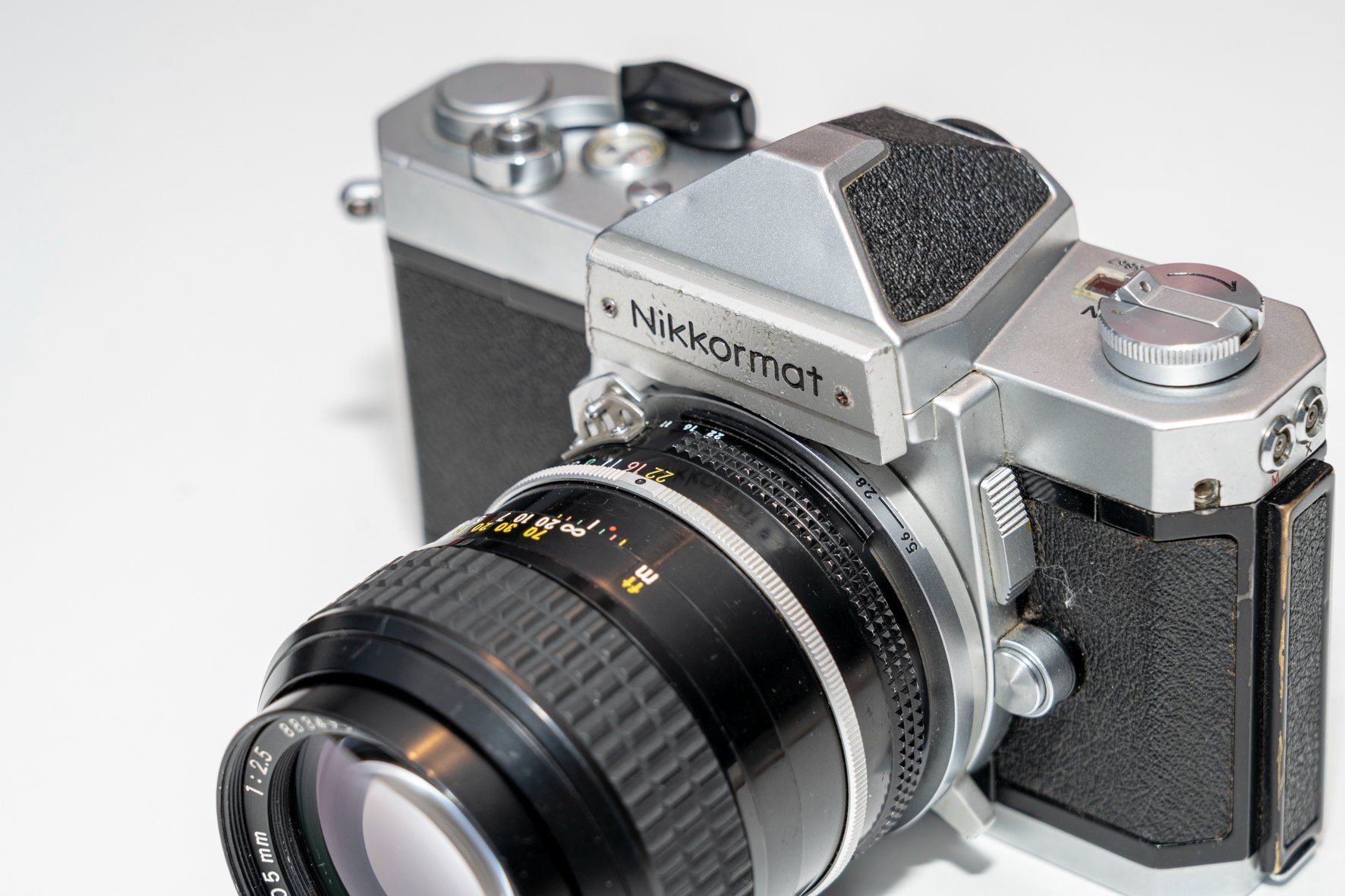 Nikkormat Kamera: Nikkormat + Nikkor 105mm 1:2.5 – Gebraucht aus Grandvaux von RGKeller 7