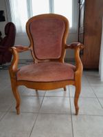 Antiker Sessel in rosarot